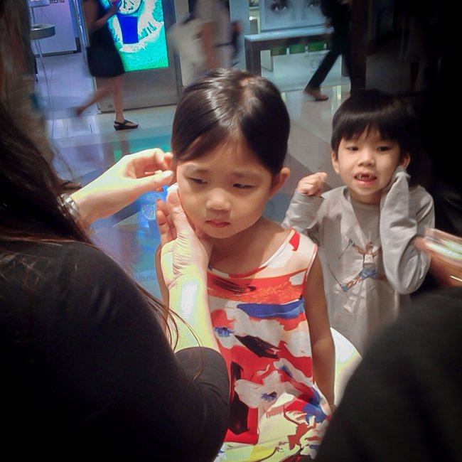 ear piecing in action